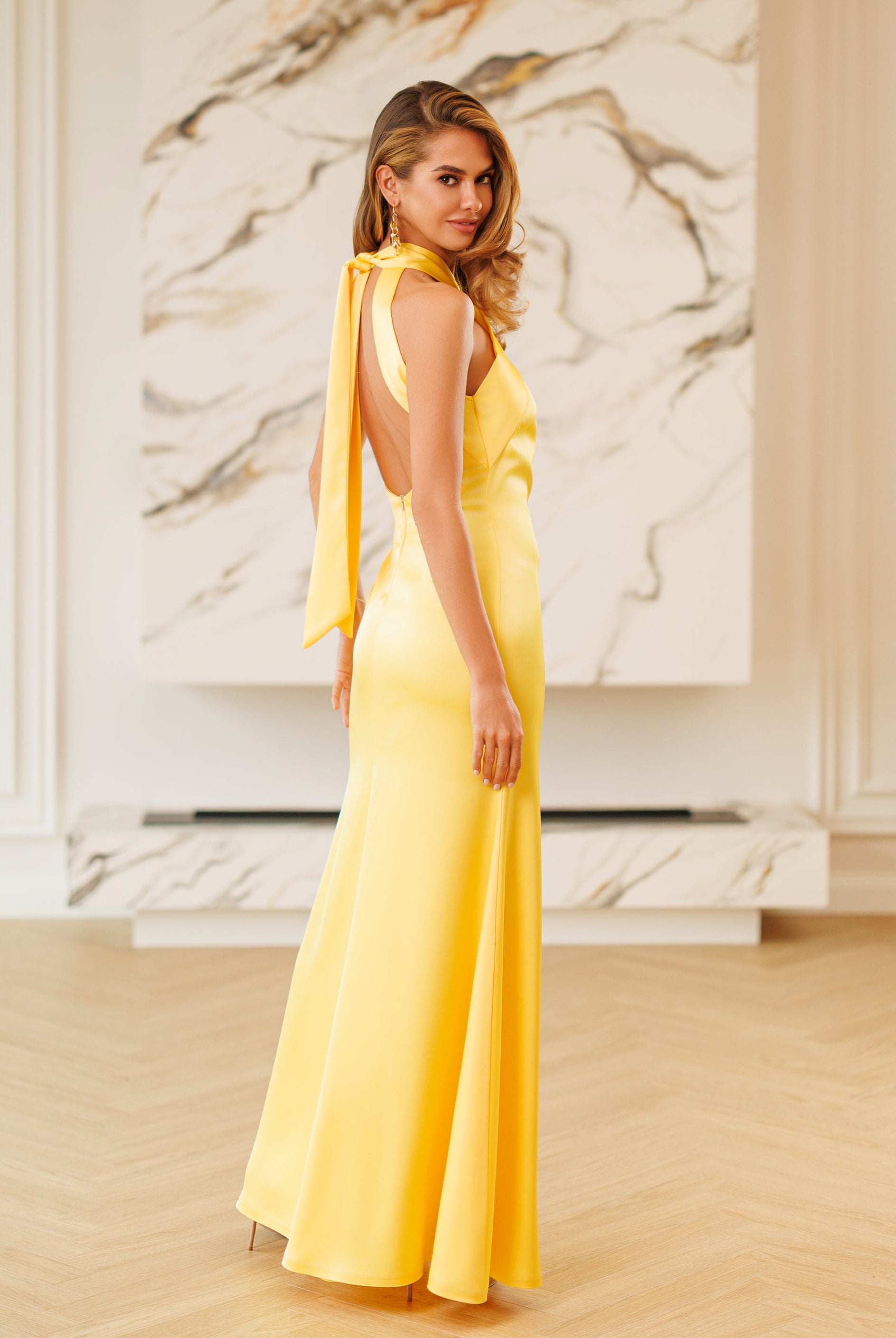 Kaia Yellow Satin Halter-Neck Open-Back Maxi Dress - front view | ELAGIA