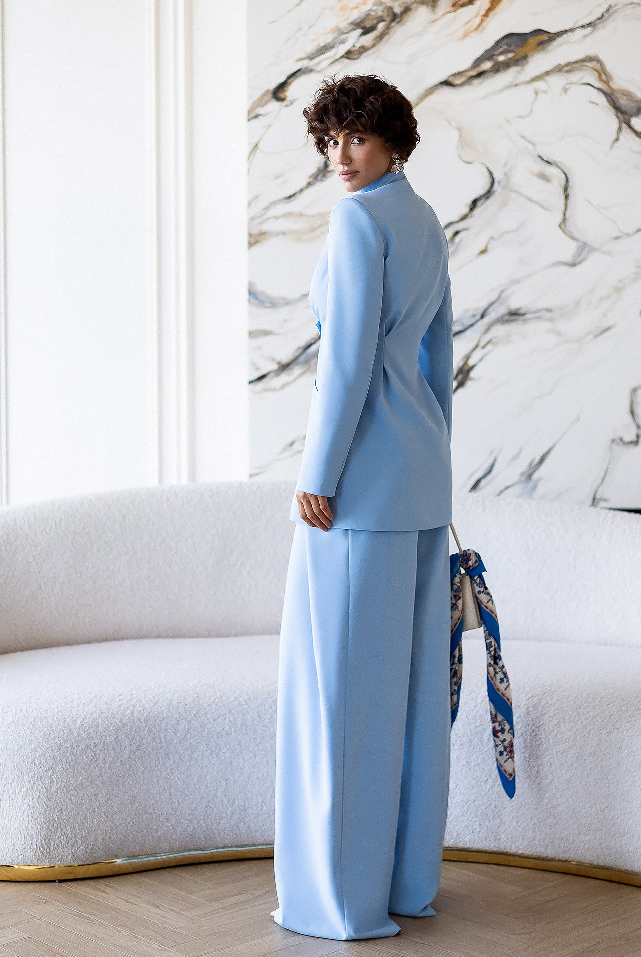 ELAGIA Avra Sky-Blue Asymmetric Double-Breasted Longline Blazer Suit 2-Piece back view - purple business suit women style