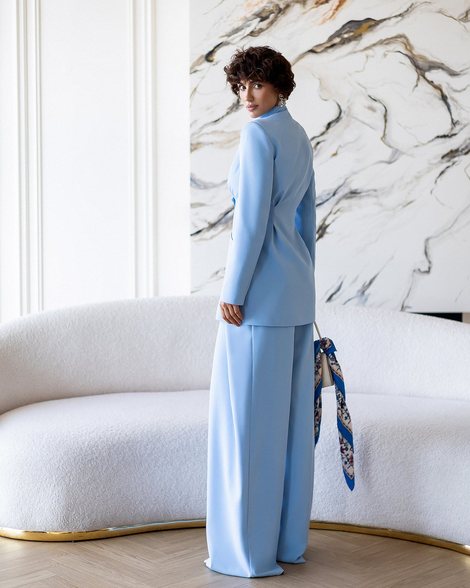 ELAGIA Avra Sky-Blue Asymmetric Double-Breasted Longline Blazer Suit 2-Piece back view - purple business suit women style