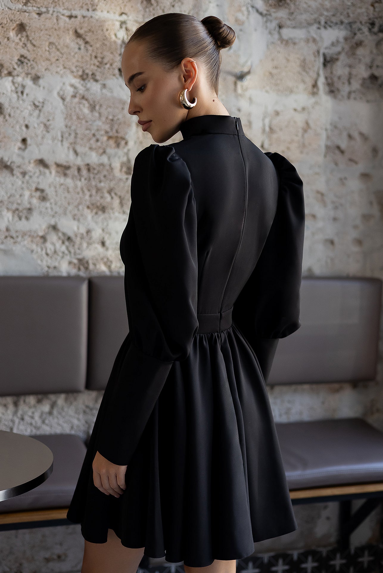 Bella Black Choker-Neck Puff Sleeve Mini Dress - close-up detail | ELAGIA