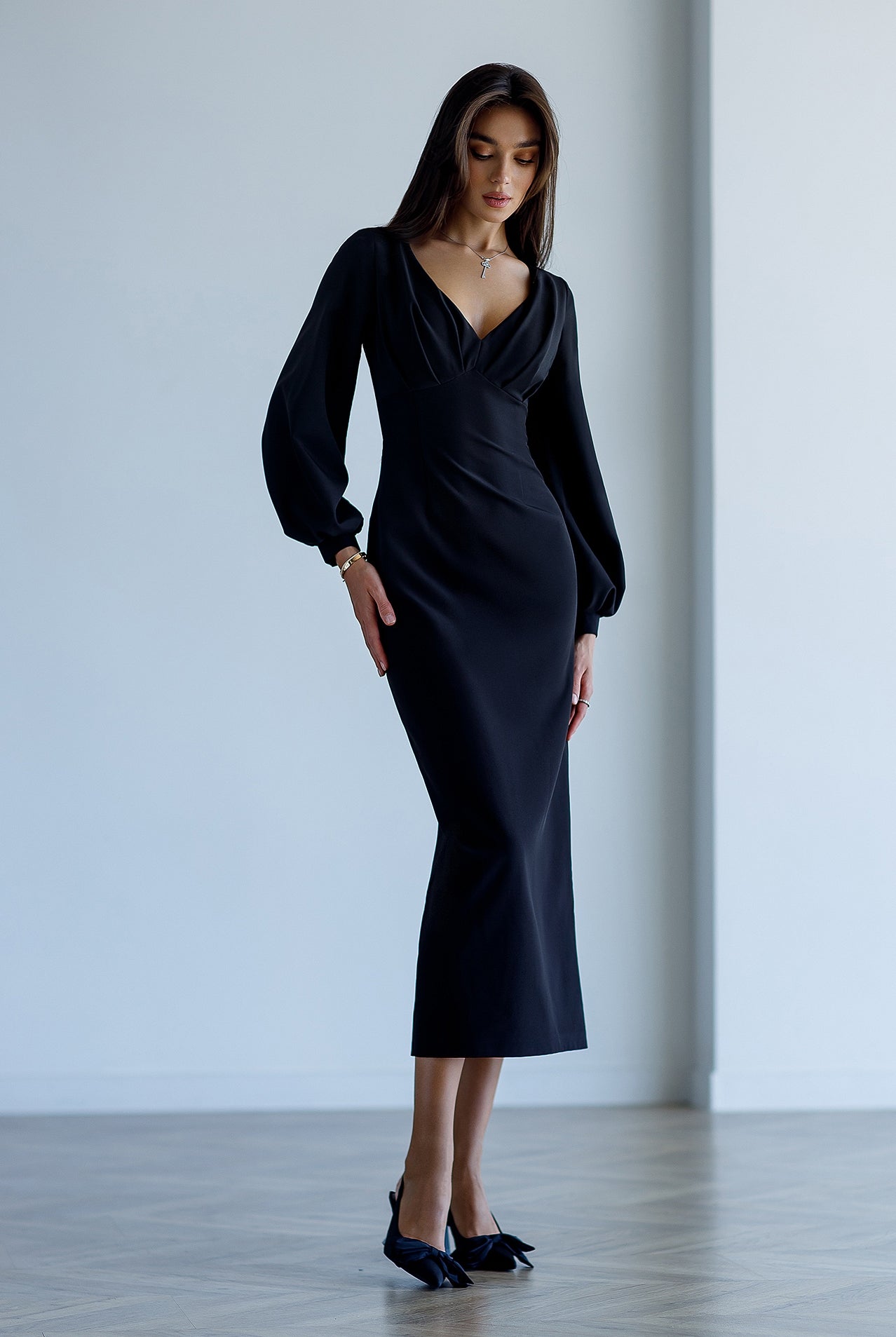 Black V-Neck Puff-Sleeve Midi Dress - front view | ELAGIA