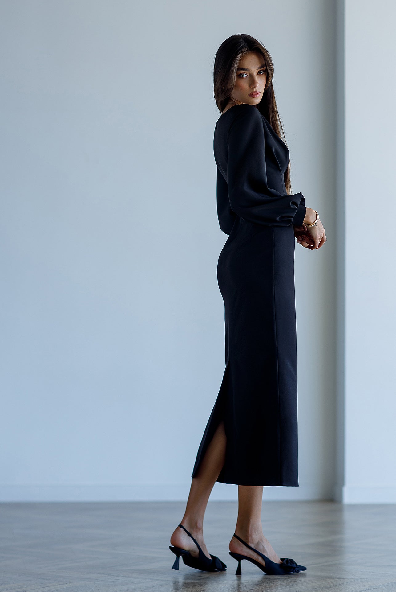 Black V-Neck Puff-Sleeve Midi Dress - side view | ELAGIA