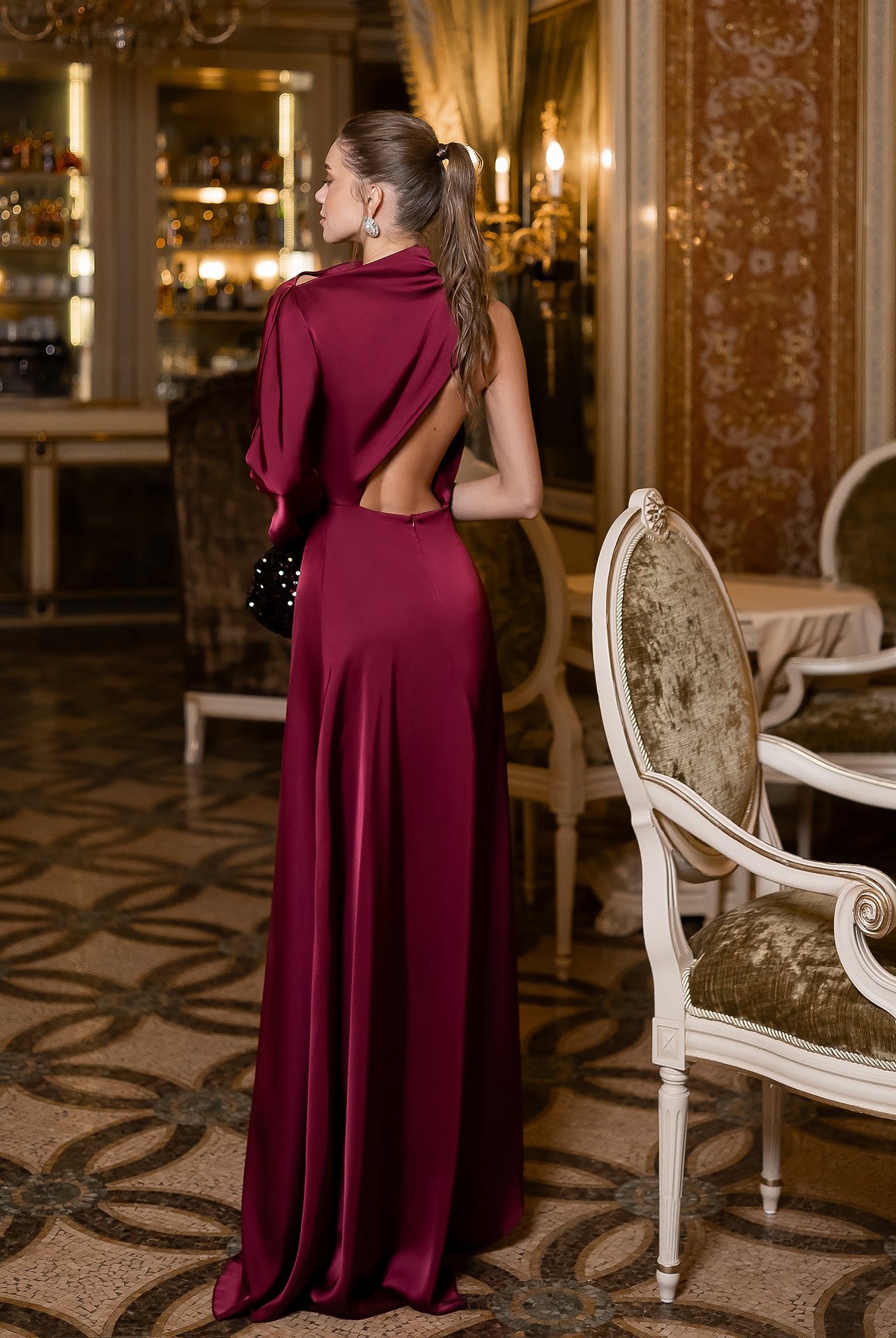 Bordeaux Satin Draped Neck One-Shoulder Maxi Dress - side view | ELAGIA