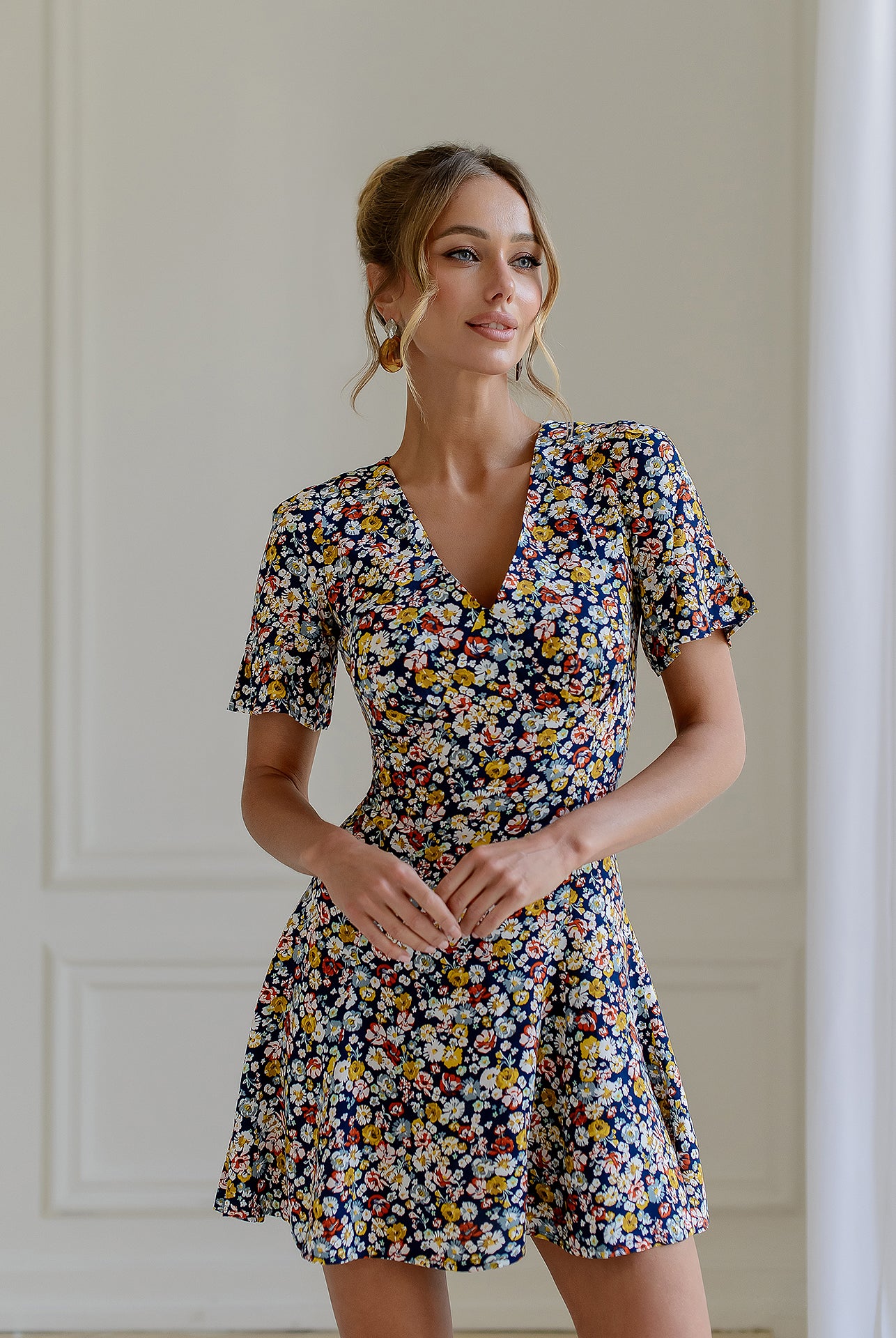 Navy Floral Print Short Sleeve Mini Dress - side view | ELAGIA