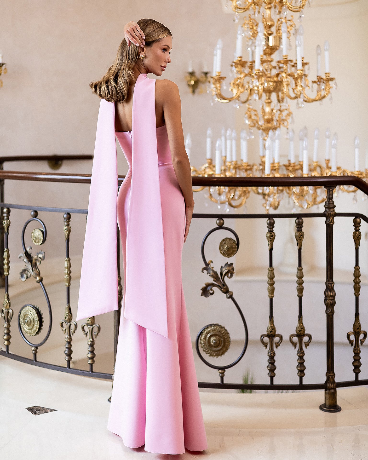 Pink strapless neck scarf draped maxi in crepe fabric, back view displaying draped scarf detail