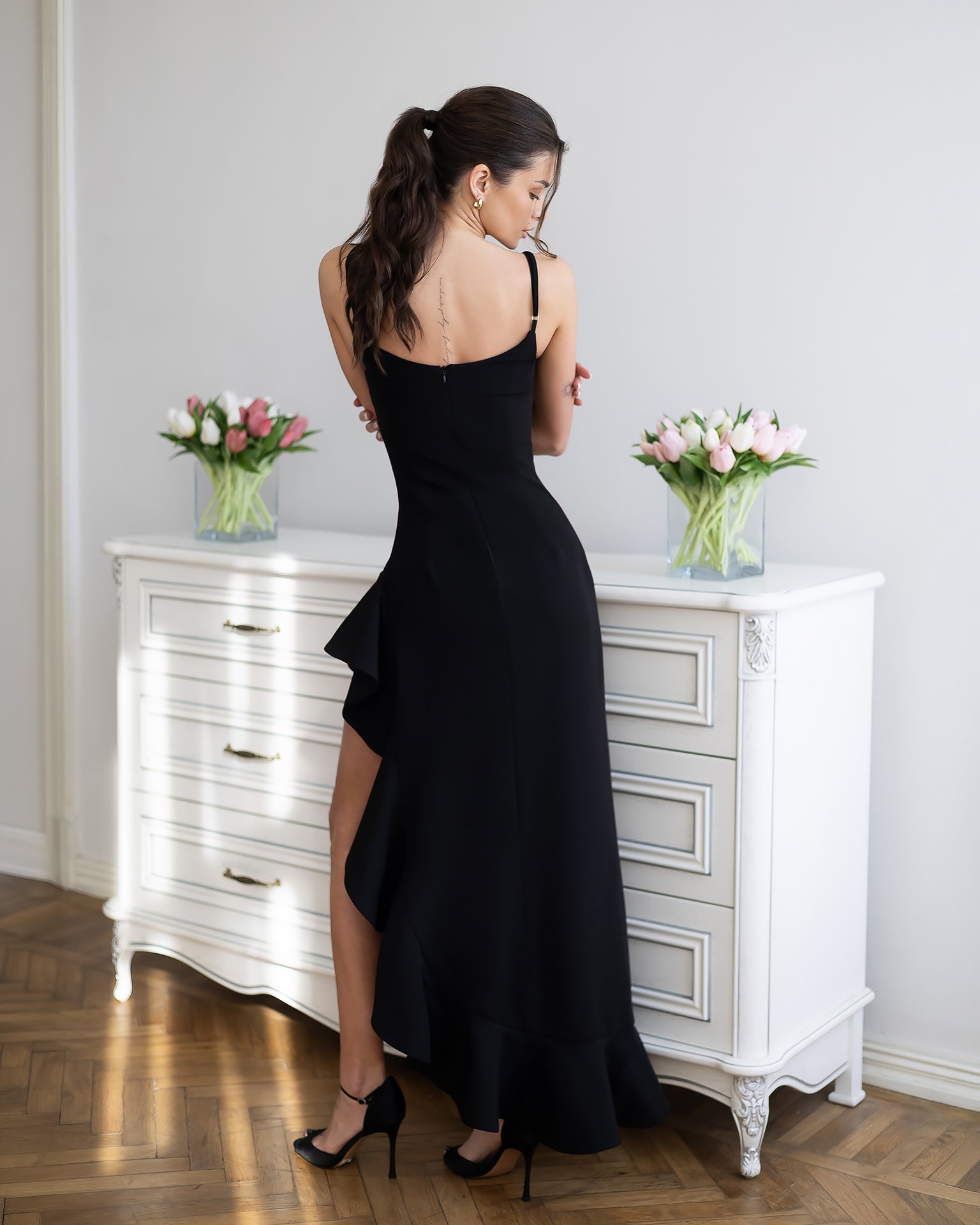 Bianca Black Asymmetric Ruffled Slip Midi Dress - side view | ELAGIA