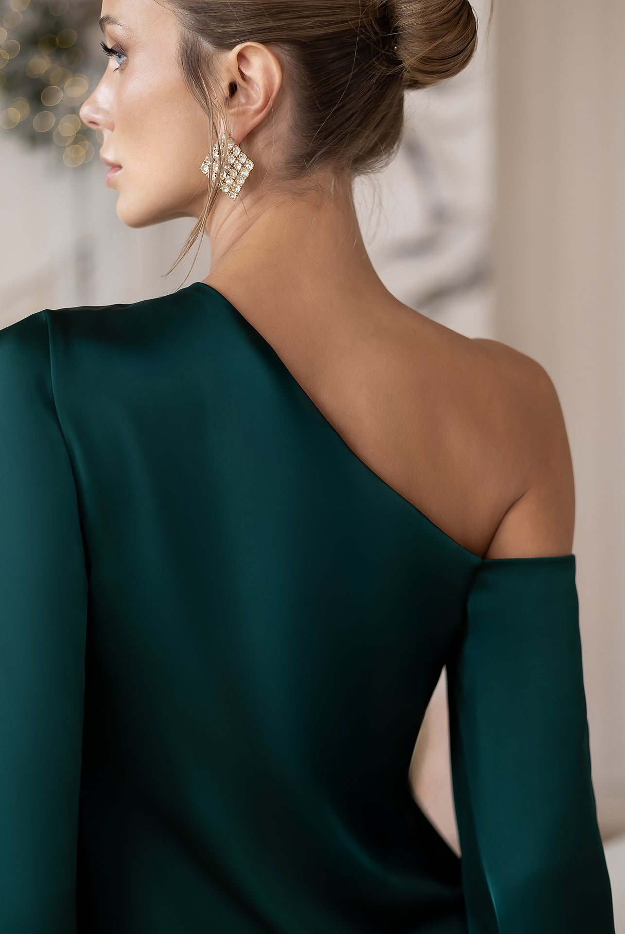 Celeste Emerald Satin Asymmetric One-Shoulder Midi Dress - close-up detail | ELAGIA