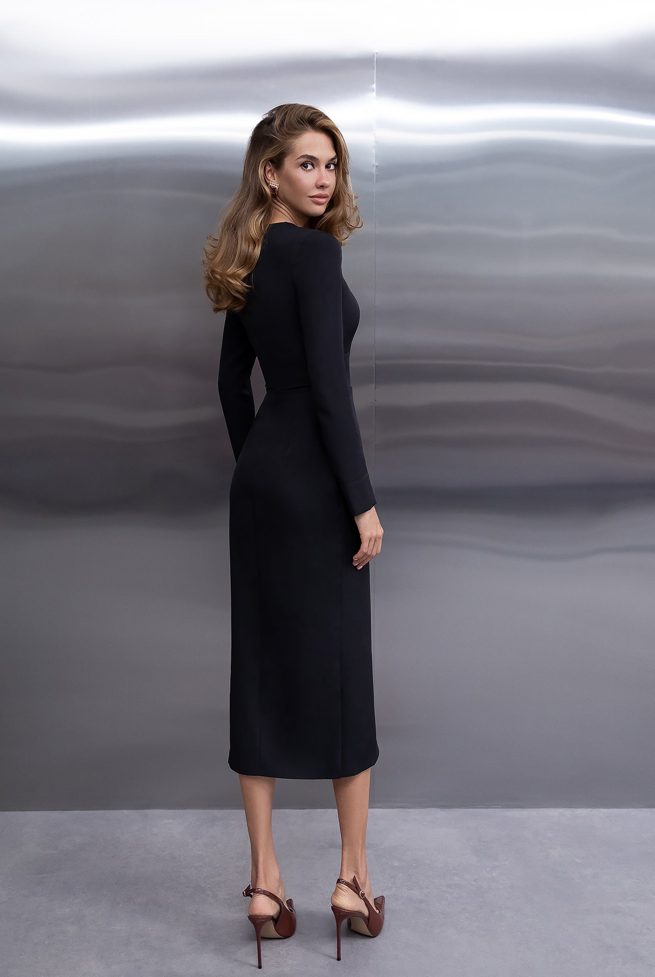 Estelle Black Long-Sleeve Slit Midi Dress - side view | ELAGIA