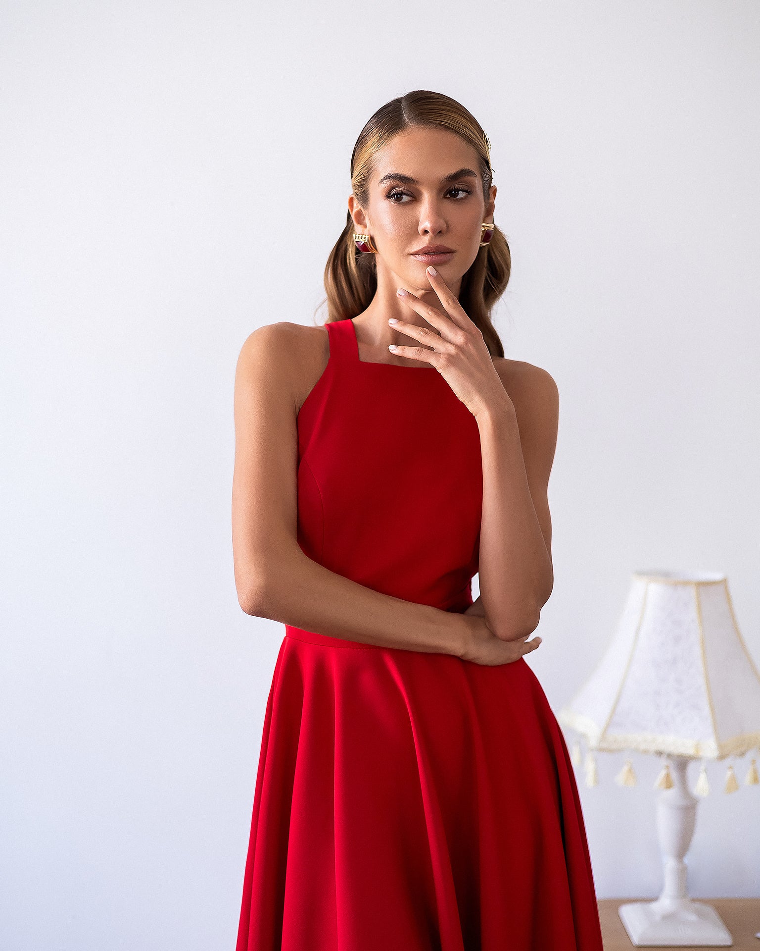 Julie Red Halter Neck Midi – crepe construction, side profile revealing drape and fit