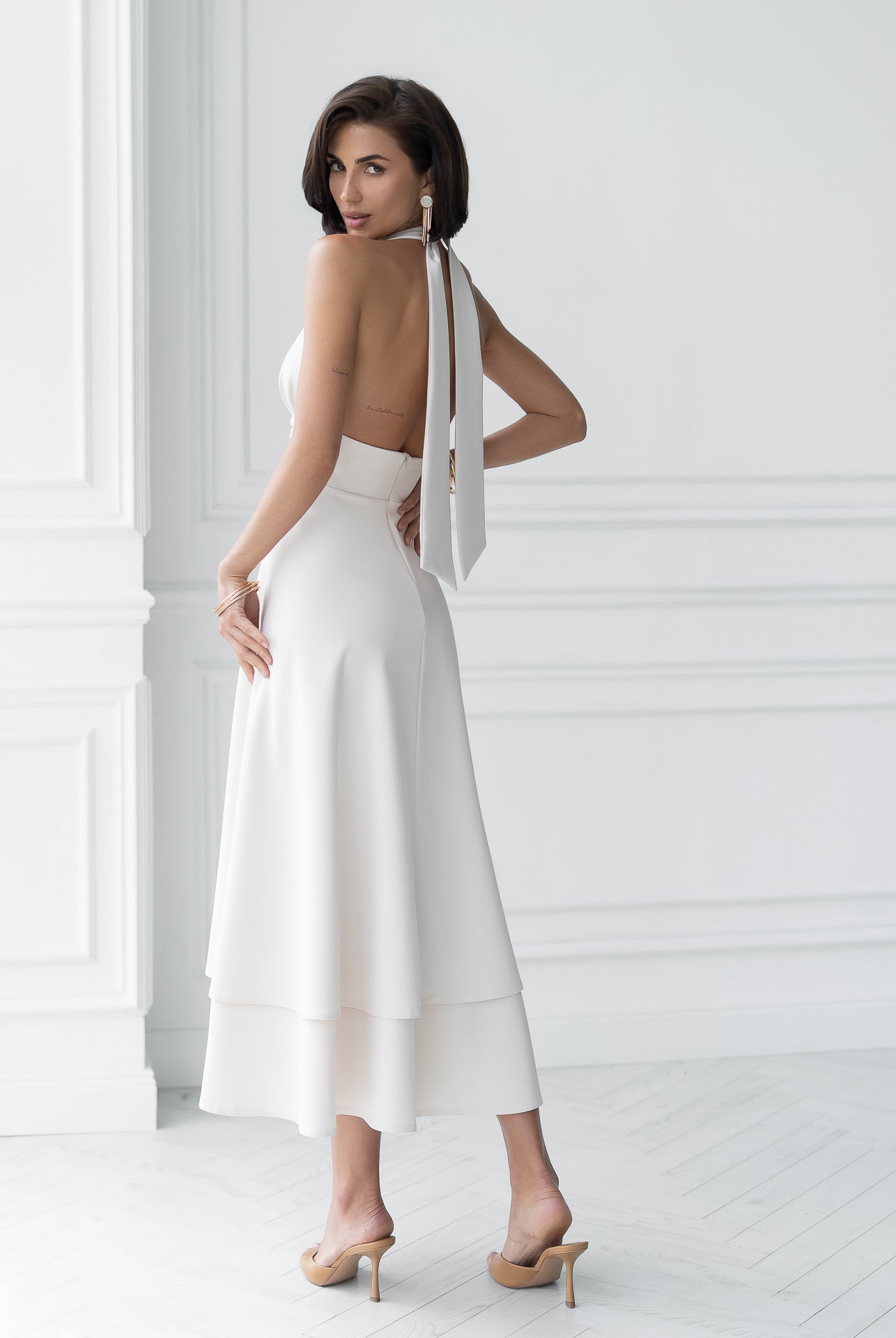 Gloria Beige Open-Back Halter-Neck Midi Dress - side view | ELAGIA