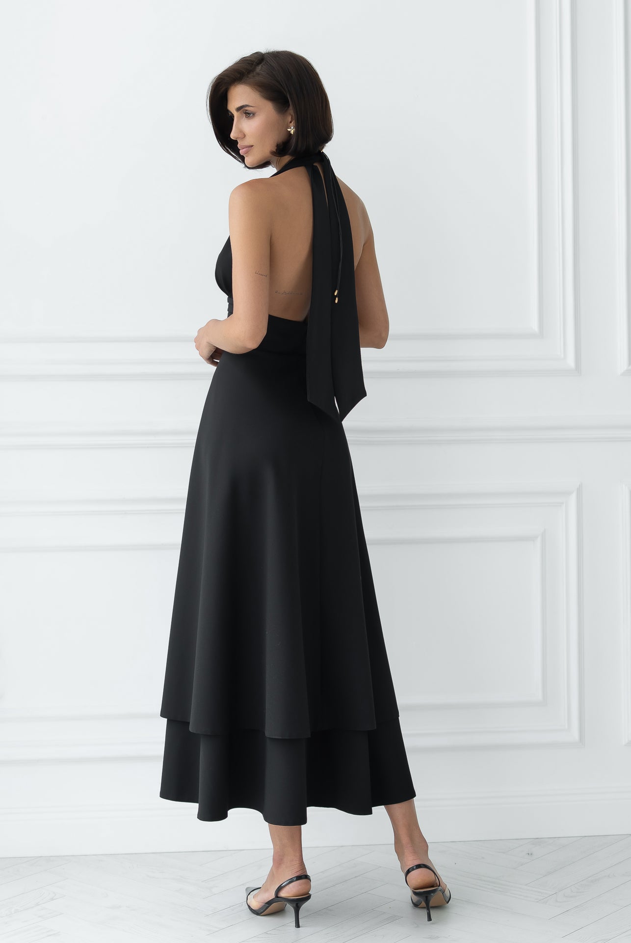 Gloria Black Open-Back Halter-Neck Midi Dress - side view | ELAGIA