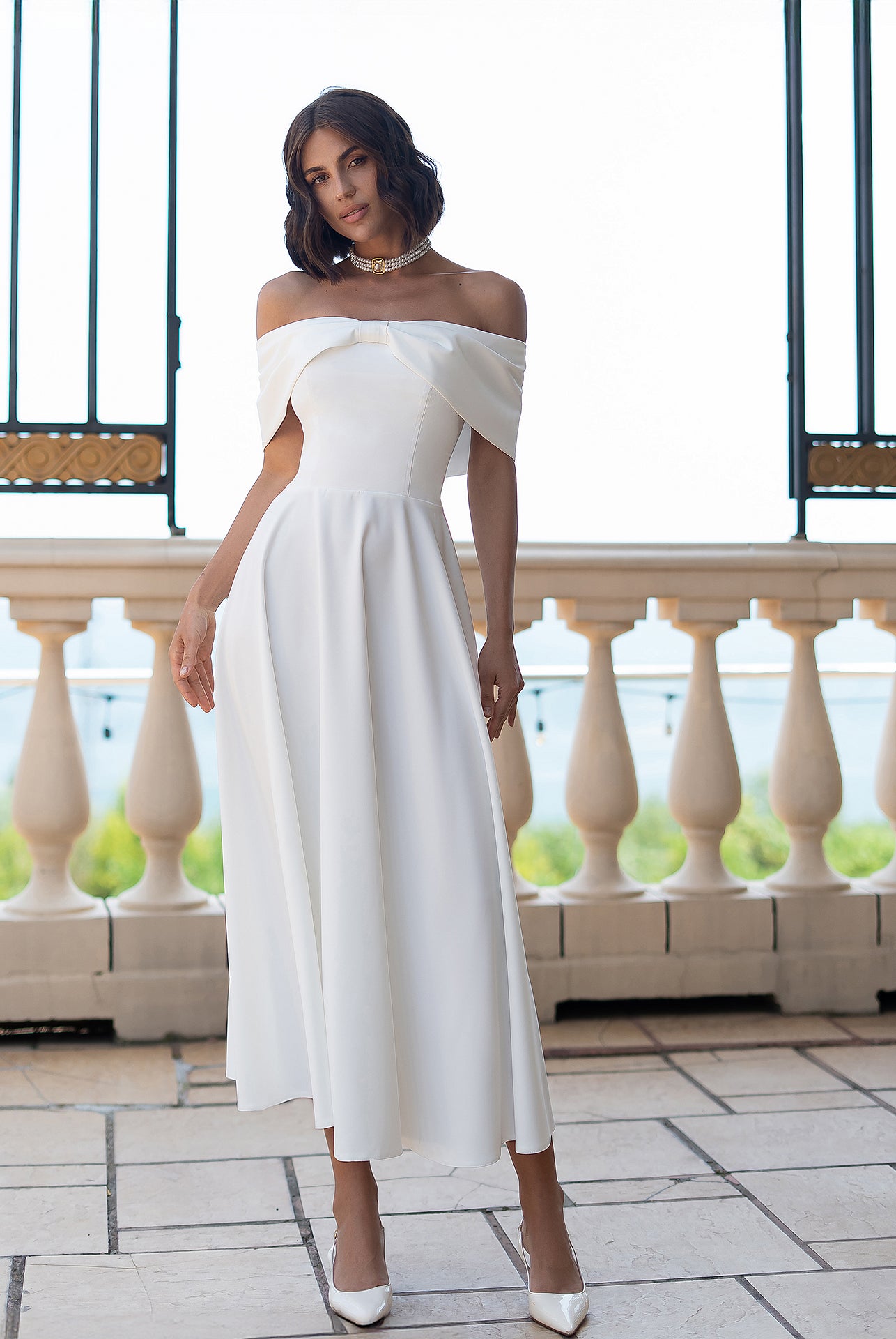 Céline White Off-Shoulder Draped-Bow Midi Dress - front view | ELAGIA