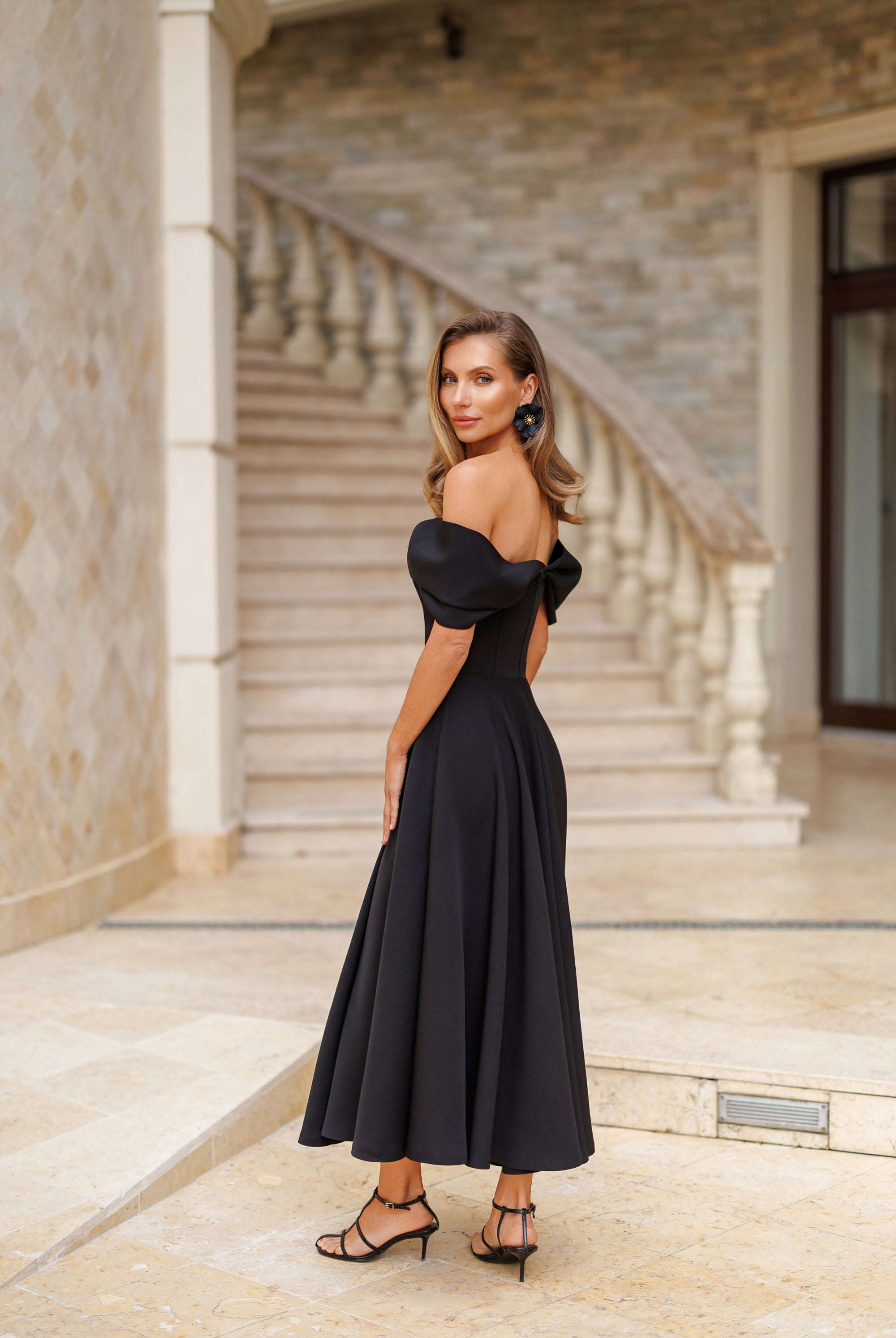 Black Off-The-Shoulder Draped Sleeve Midi Dress - side view | ELAGIA