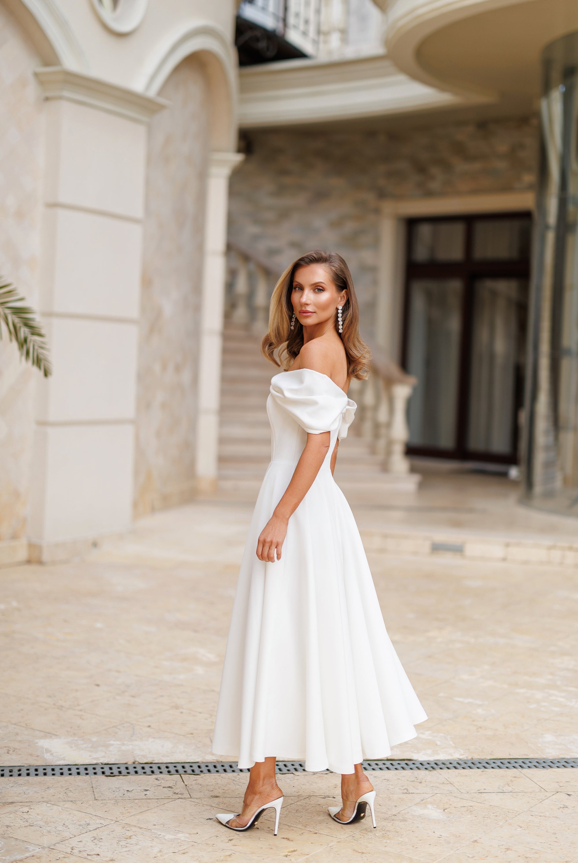 White Off-The-Shoulder Draped Sleeve Midi Dress - side view | ELAGIA
