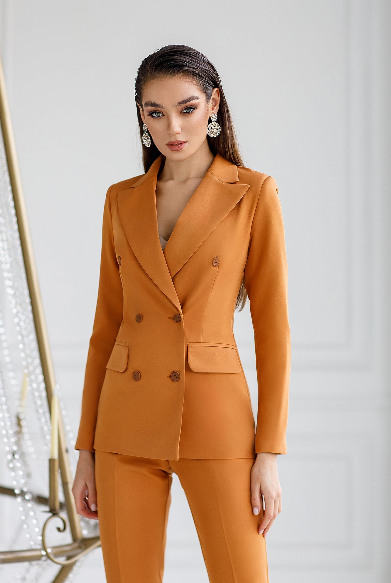 ELAGIA camel 2-piece suit styled on model showing professional women's blazer and trouser coordinated outfit