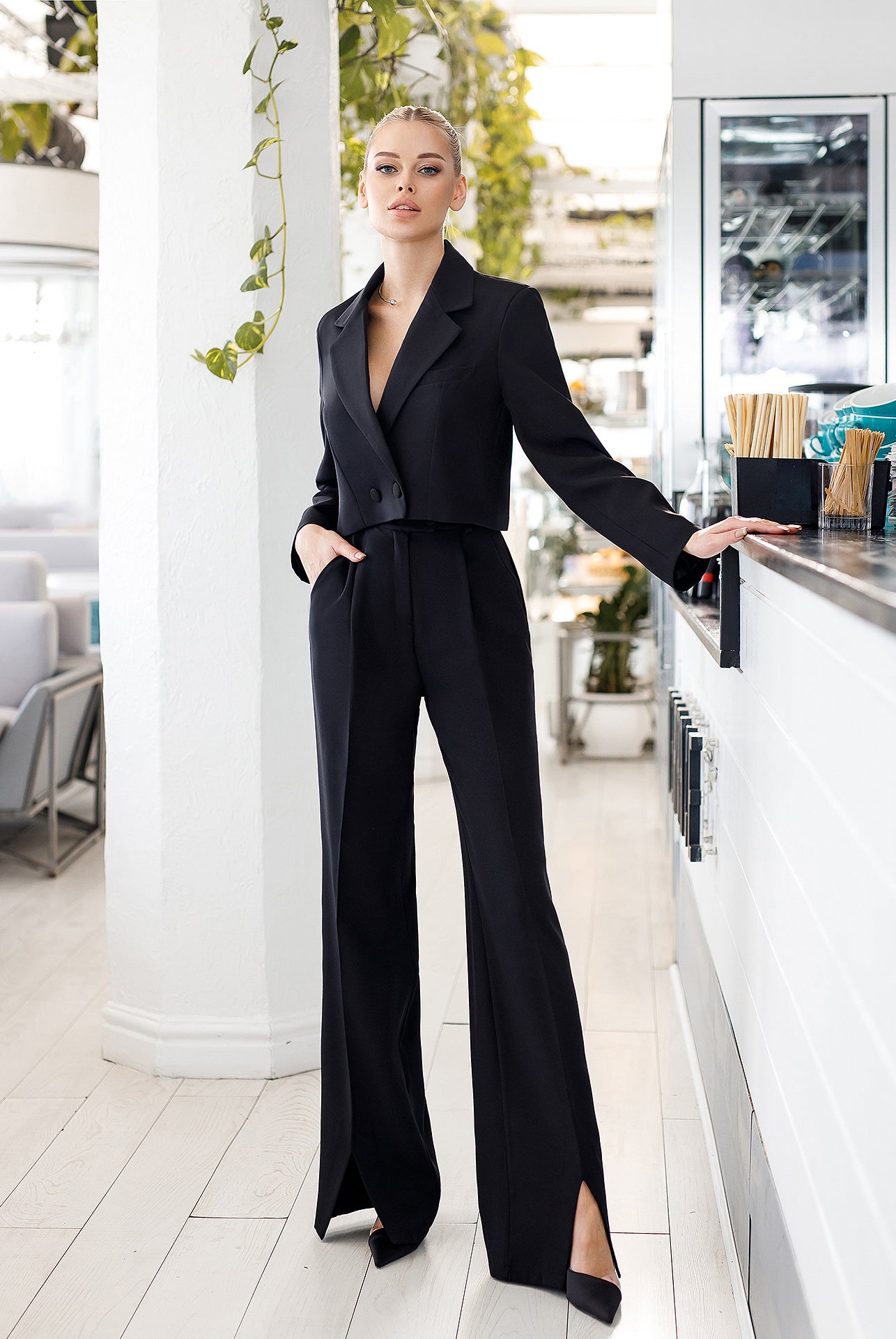 ELAGIA Black Crop Jacket Suit 2-Piece model walking pose - 3 piece women's suit movement and fit display