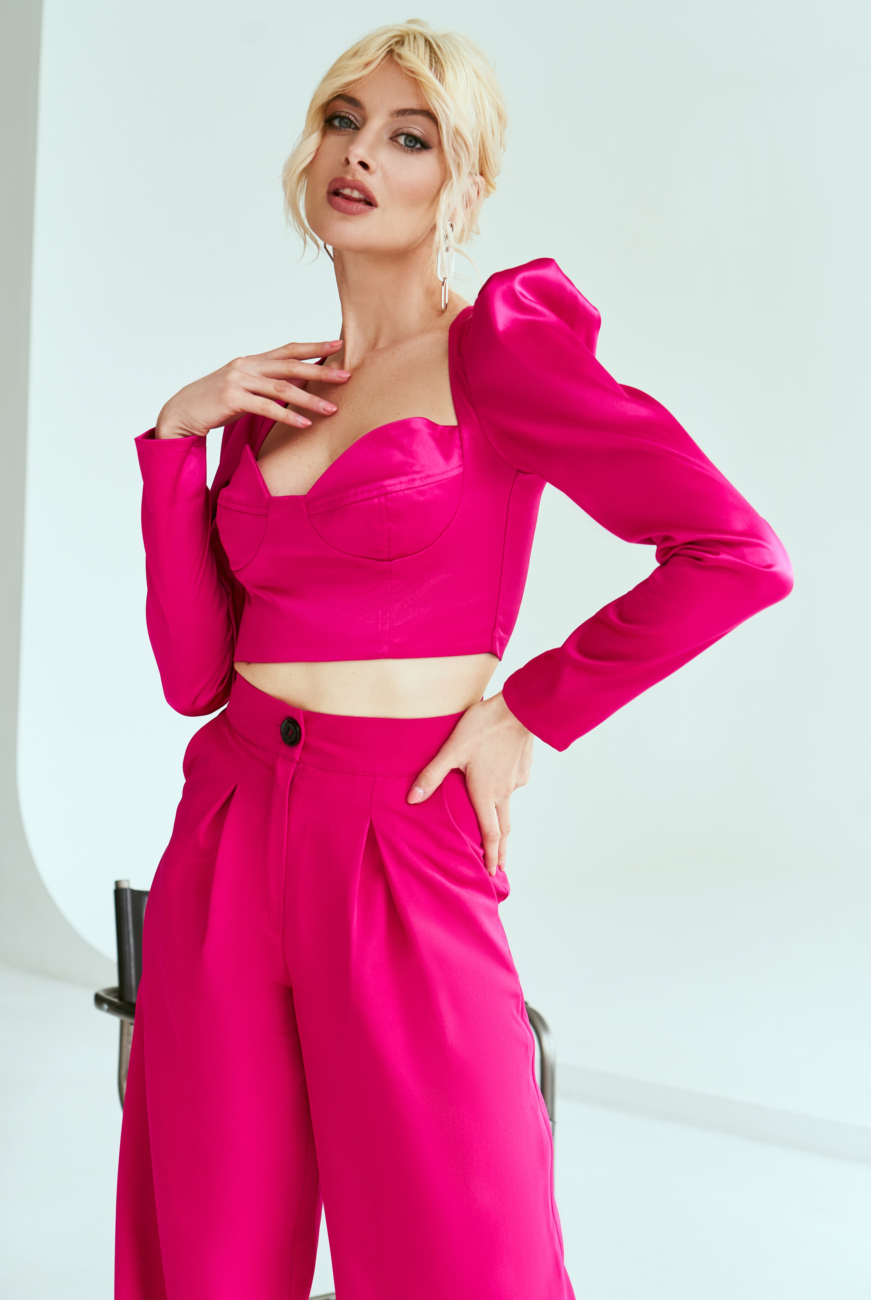 ELAGIA Crimson Sweetheart Puff-Sleeve Top lifestyle shot - elegant white dress long sleeve in styled setting