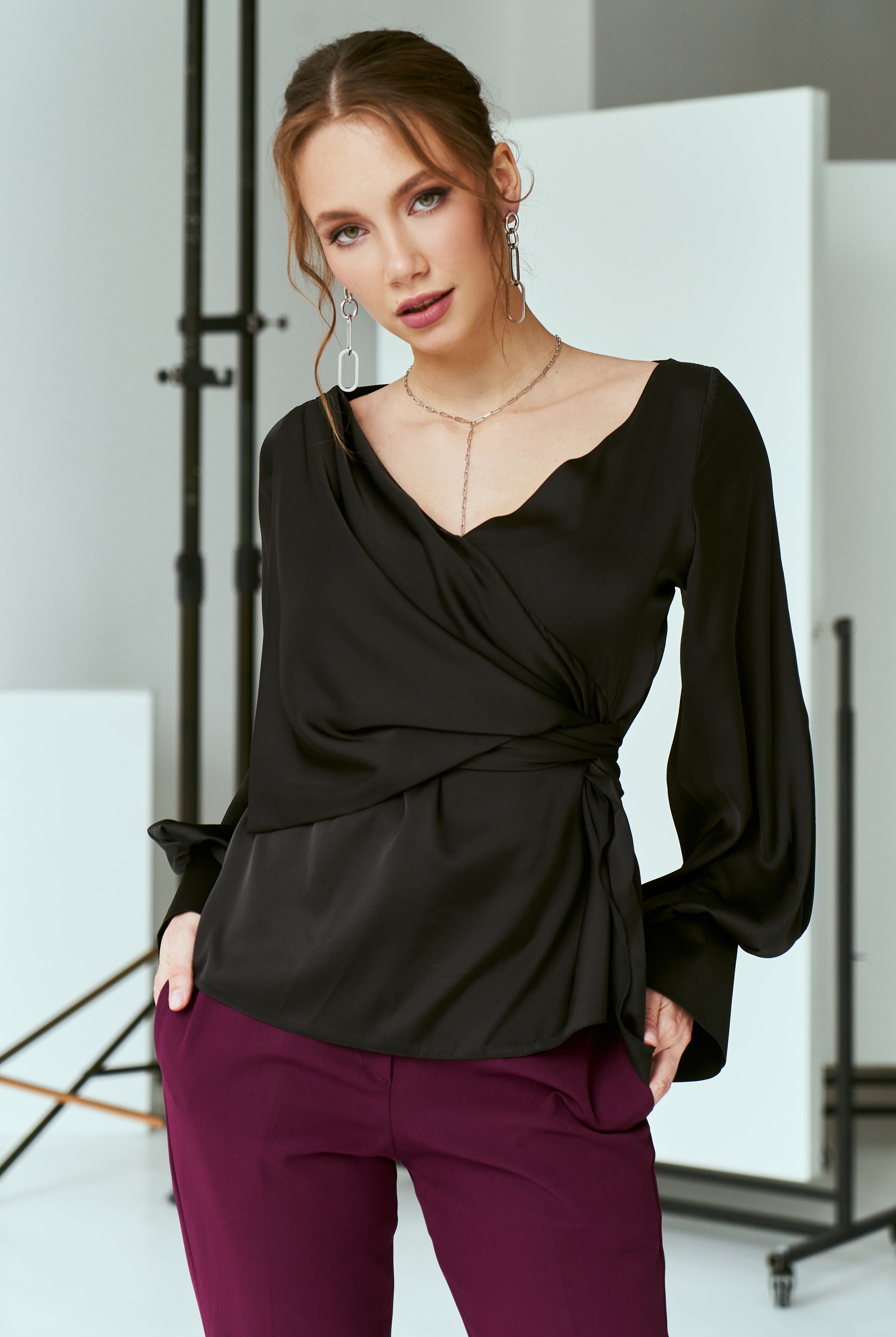 ELAGIA black silk puff-sleeve wrap blouse front view - women's black suit set coordinating piece
