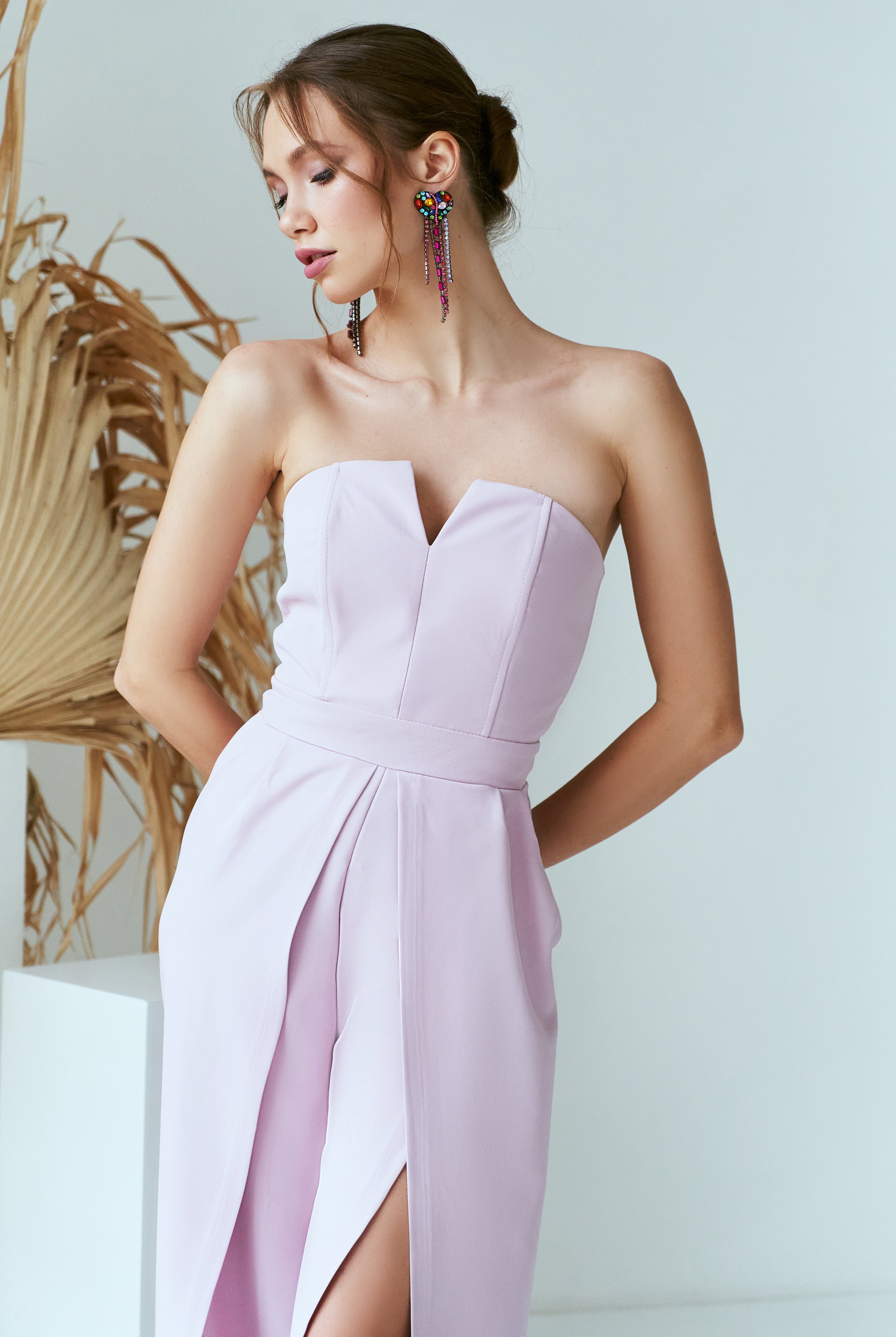 ELAGIA dusty pink strapless v-neck jumpsuit back view showcasing elegant silhouette - pink suit styling