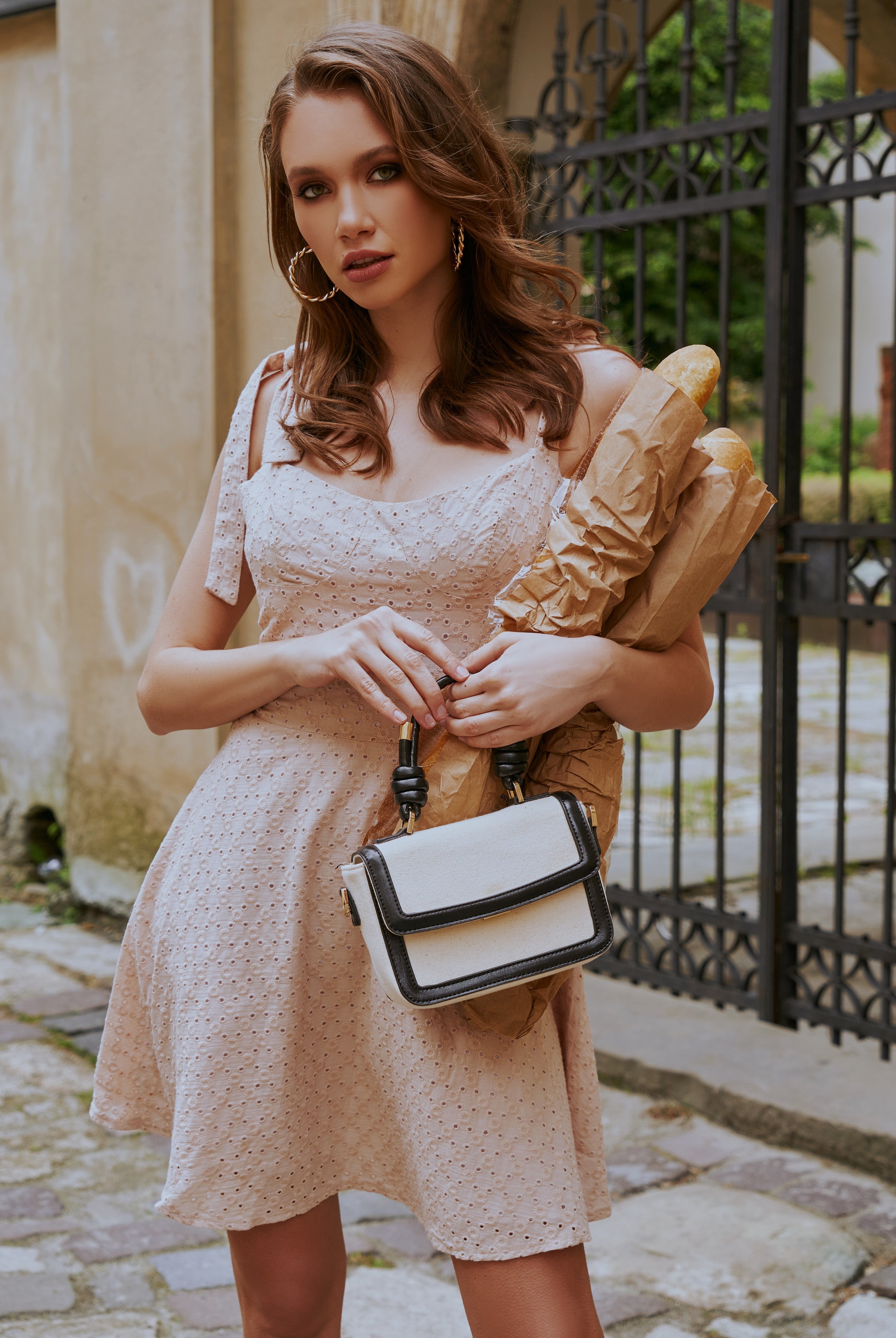 ELAGIA Beige Sleeveless Mini Dress full outfit coordination showing versatility for work or casual wear