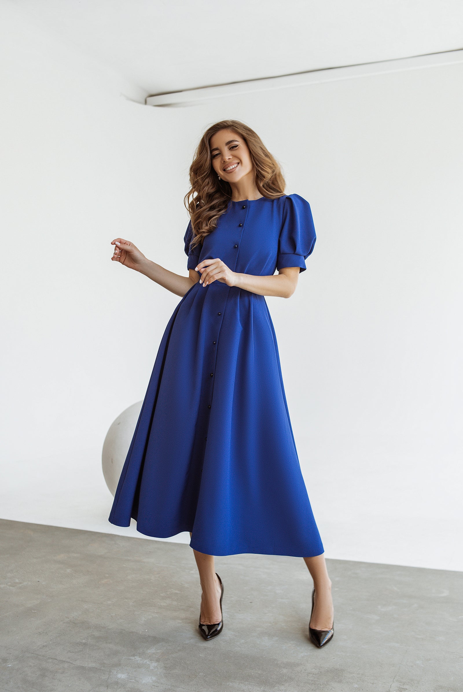 ELAGIA blue buttoned puff-sleeve midi dress front view - 3 piece women's suit purple business suit women style