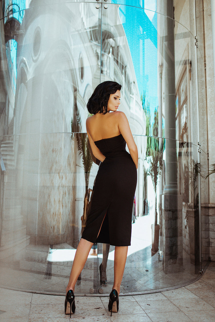 ELAGIA black strapless asymmetric cocktail dress detail showing textured fabric and asymmetrical design elements