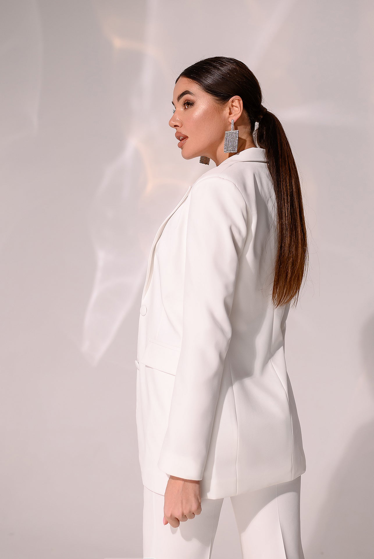 ELAGIA white shawl lapel suit lifestyle shot - professional purple business suit women ensemble
