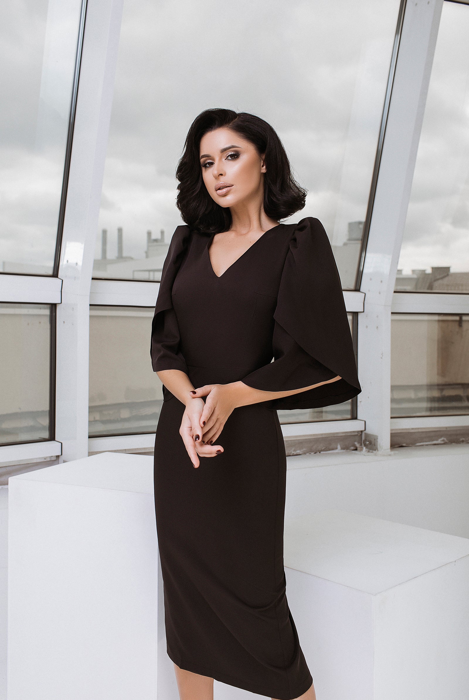 ELAGIA black V-neck bell sleeve midi dress back view with purple business suit women influenced tailoring