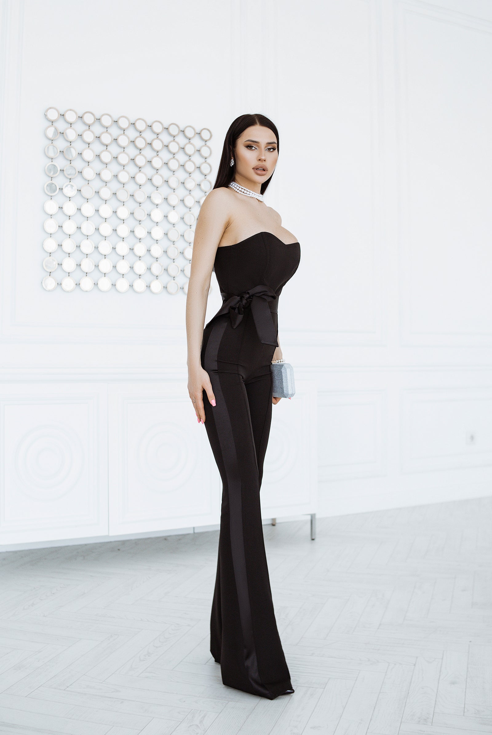 Black Strapless Bow-Detail Jumpsuit - back view | ELAGIA