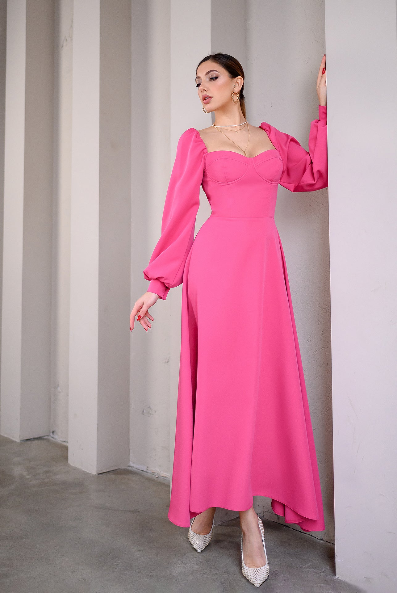 ELAGIA Crimson Puff-Sleeve Midi Dress - lifestyle image showing dress in motion, capturing fabric movement