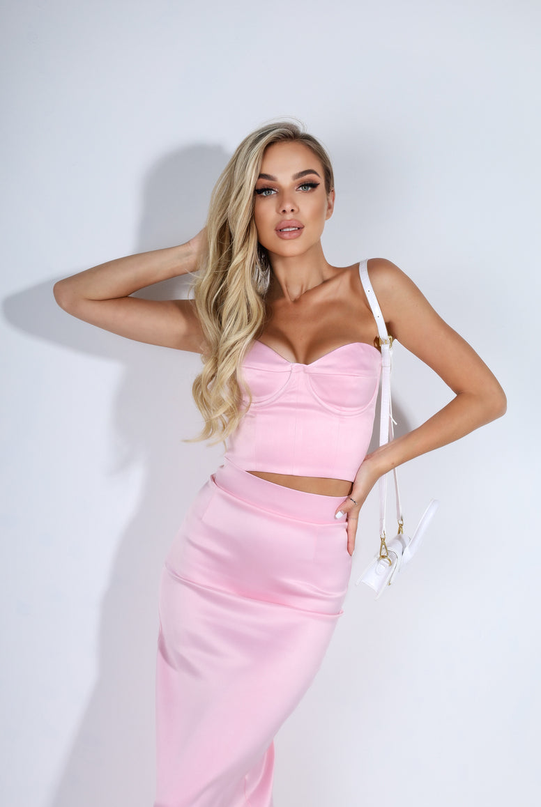 ELAGIA hot pink suit womens satin skirt - close-up of midi length hemline and fabric drape