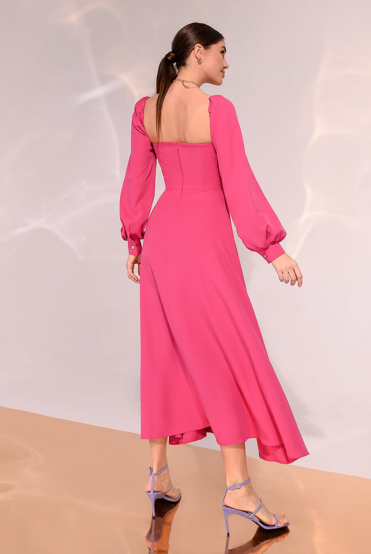 ELAGIA Crimson Puff-Sleeve Midi Dress - three-quarter view emphasizing A-line skirt and sleeve volume proportion