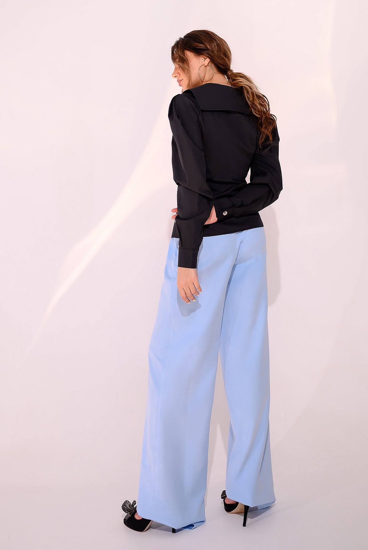 ELAGIA black puff sleeve collared blouse - styled view with accessories, part of womens black suit ensemble