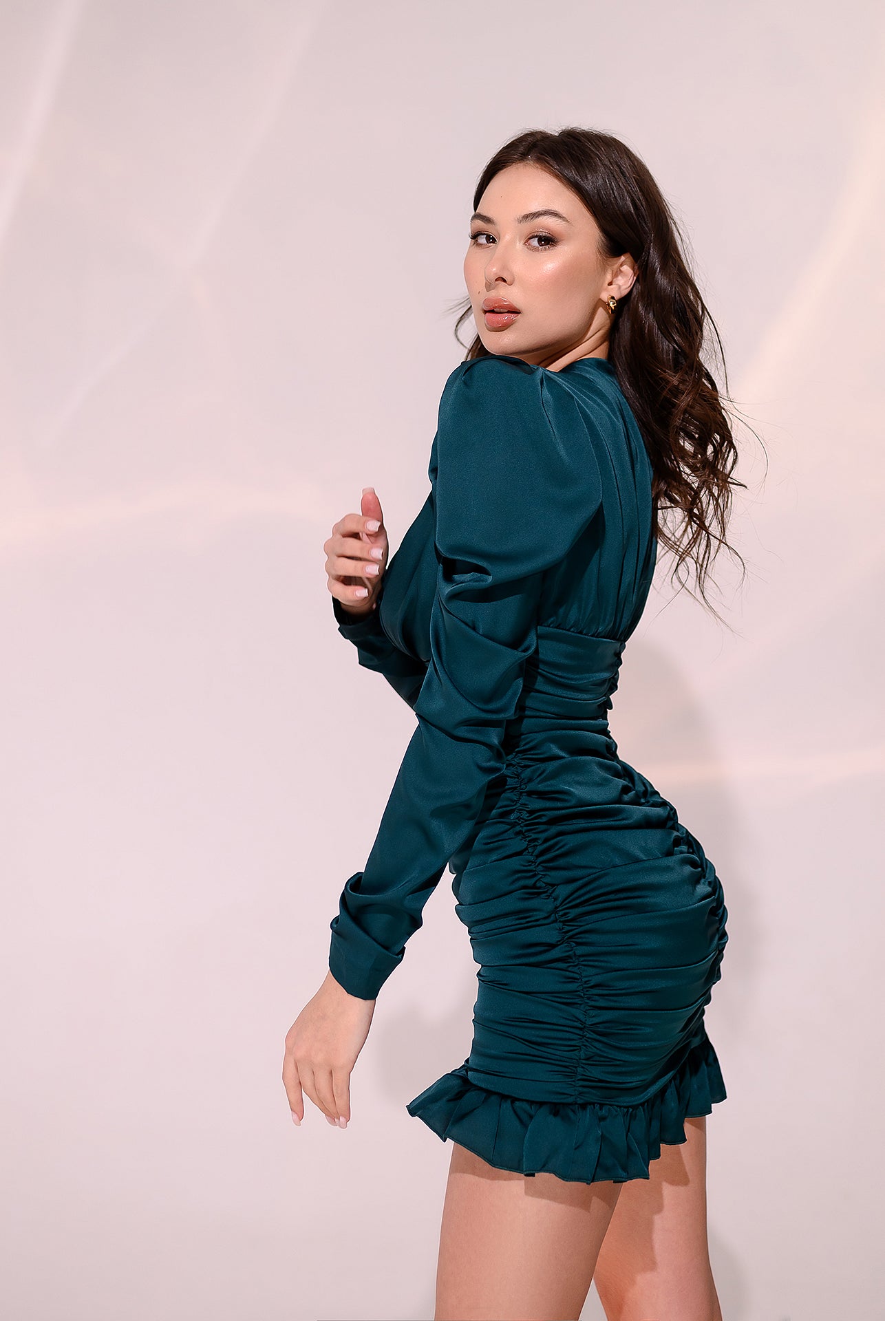 ELAGIA Emerald Silk Long Sleeve Ruched Mini Dress - neckline and sleeve detail in emerald silk fabric
