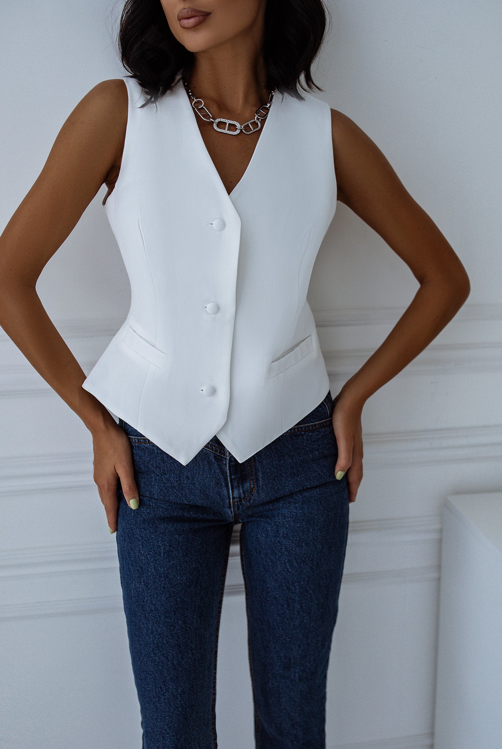 ELAGIA white formal vest detail close-up - white suit for women structured formal vest