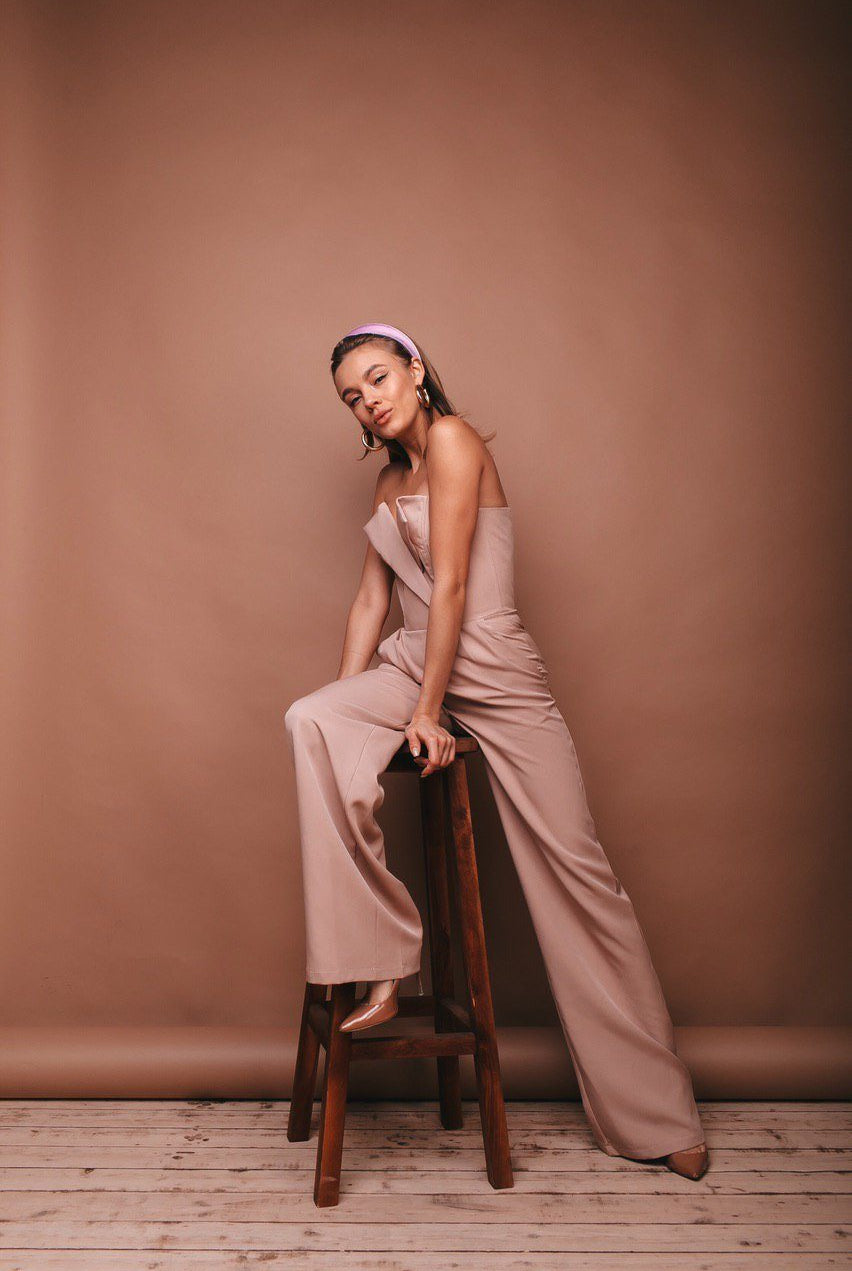 ELAGIA beige V-neck sleeveless jumpsuit back view - blue jumpsuit style showing rear silhouette and fit