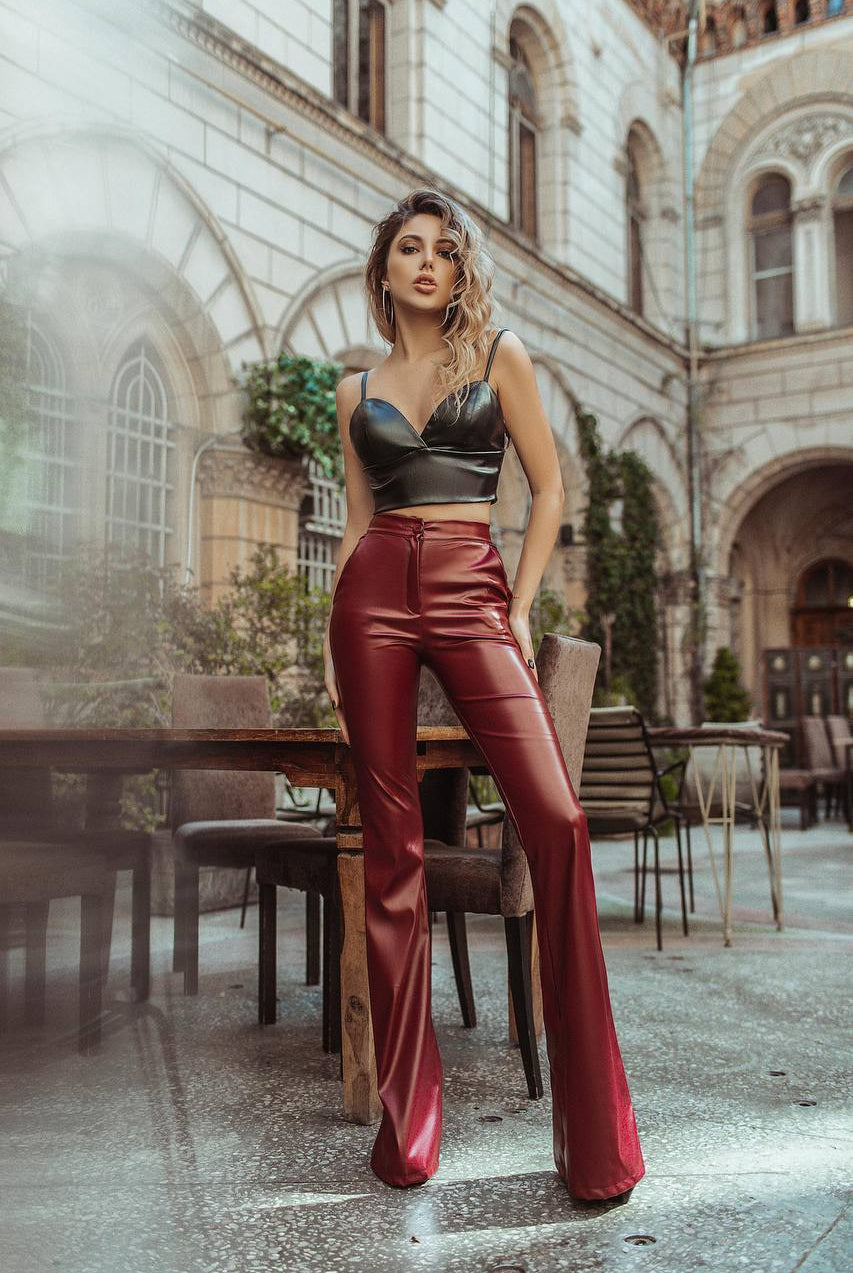ELAGIA Black Vegan Leather Crop Top lifestyle shot - womens black suit styled for modern professional wear