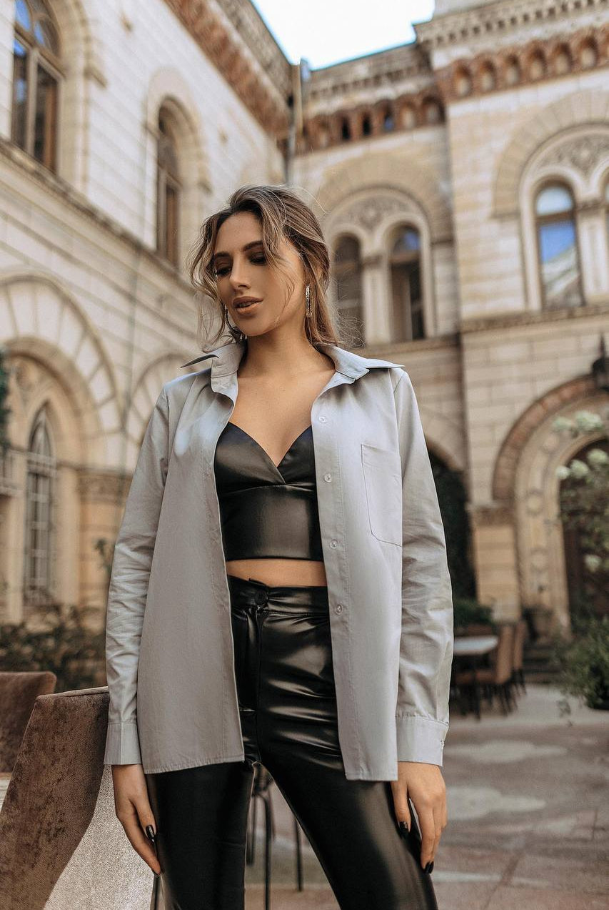 ELAGIA black vegan leather crop top worn by model - sophisticated women's black suit set styling option