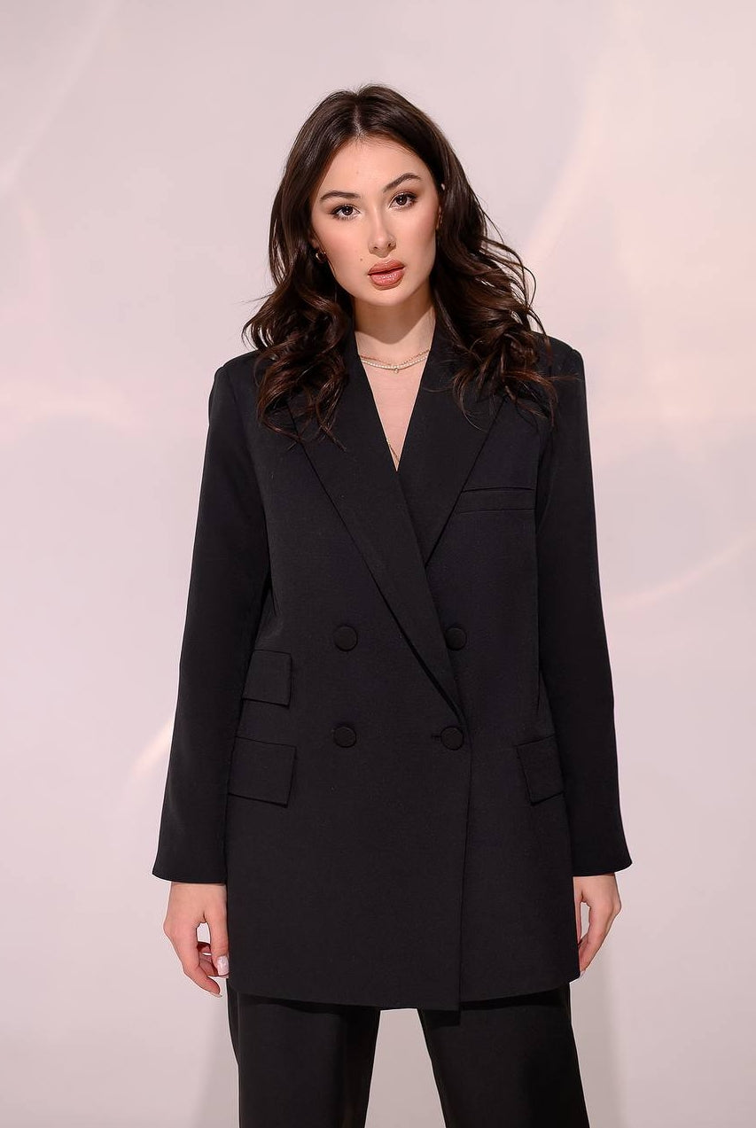 ELAGIA black 2-piece suit detail shot highlighting double-breasted button closure and lapel construction
