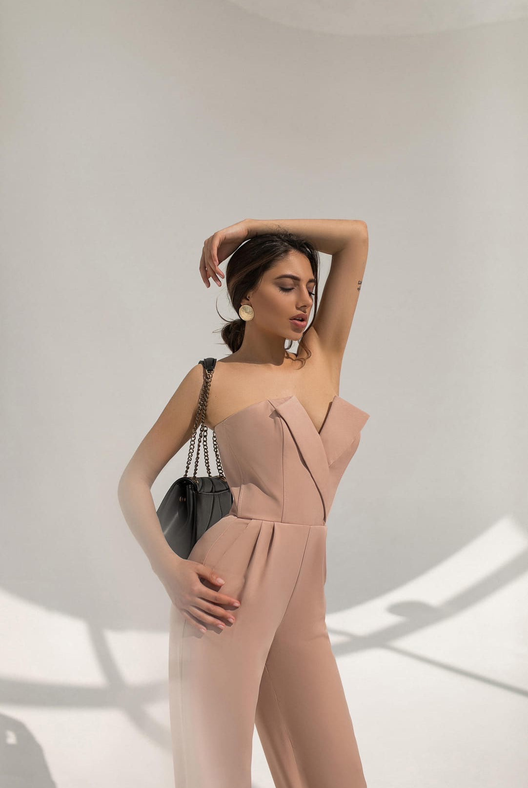 ELAGIA beige V-neck sleeveless jumpsuit front view - blue jumpsuit style for women's casual wear