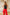 Kaia Red Asymmetric Overlay Straight-Leg Pants - close-up detail | ELAGIA
