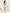 Beige Backless Puff-Sleeve Mini Dress - back view | ELAGIA
