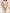 Beige Backless Puff-Sleeve Mini Dress - side view | ELAGIA