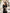 ELAGIA Black Puff-Sleeve Midi Dress close-up of balloon sleeves with purple business suit women styling elements
