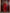 ELAGIA Novelle Red Satin Twist-Front Cut-Out Maxi Dress front view - sleek 3 piece women's suit alternative