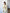 ELAGIA Novelle Yellow Satin Twist-Front Cut-Out Maxi Dress front view - luxurious purple business suit women inspired design