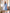 ELAGIA sky-blue satin bow back midi dress close-up of neckline and bodice tailoring details for women