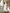 ELAGIA White Satin Bow Back Midi Dress back view showing signature bow detail - purple business suit women alternative