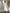 ELAGIA White Satin Bow Back Midi Dress side profile - sophisticated midi length perfect for 3 piece women's suit look