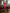 Red High Neck Puff Sleeve Cut-Out Back Midi Dress - side view | ELAGIA